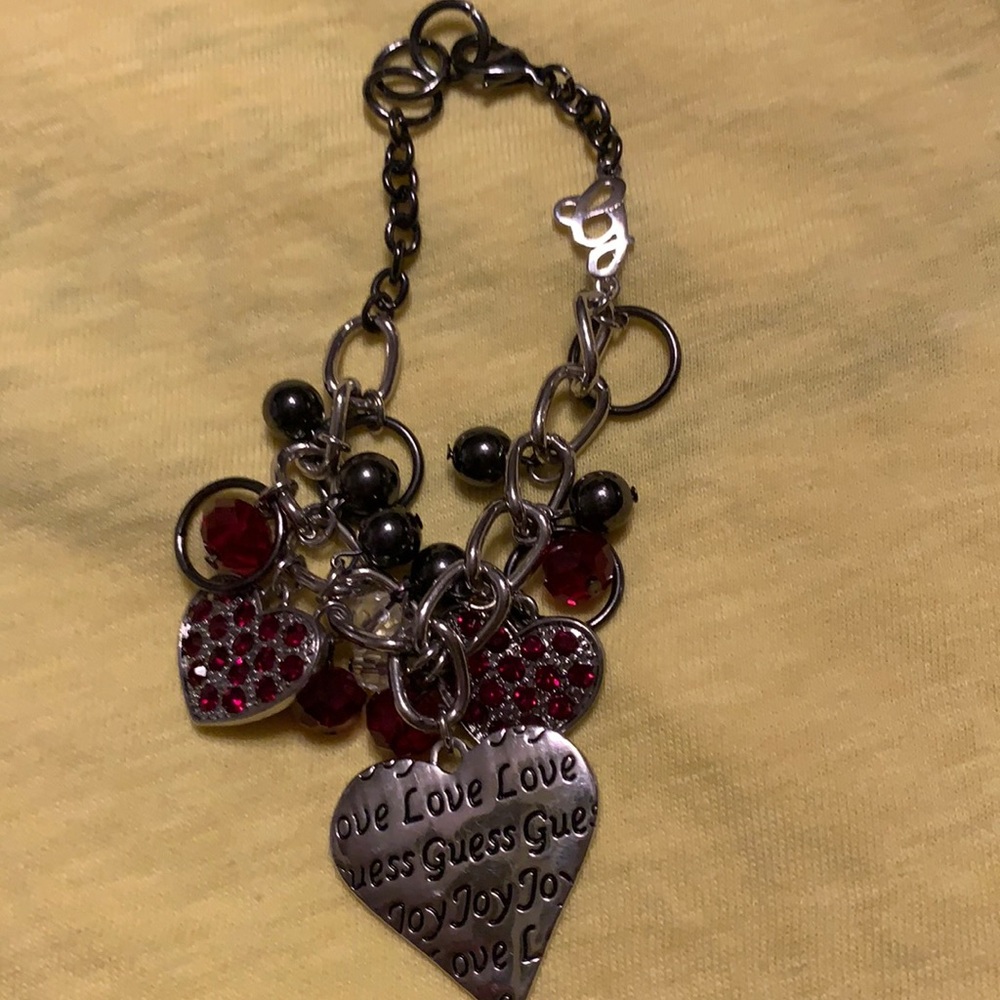 Guess heart bracelet good cond 9 inches long